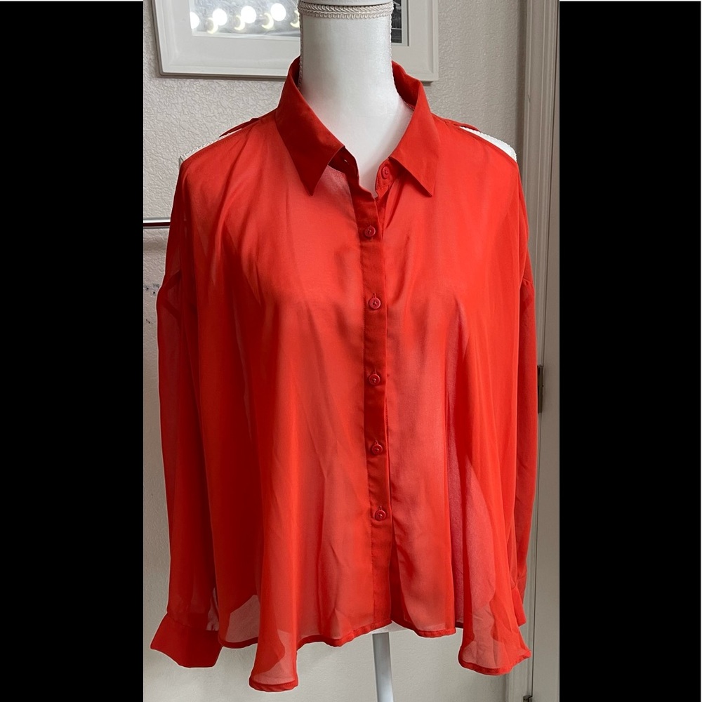 Jennifer Lopez LG Orange Blouse